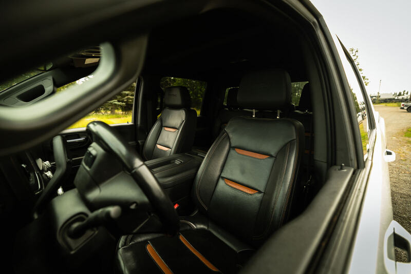 Front seats of the GMC Sierra in black leather