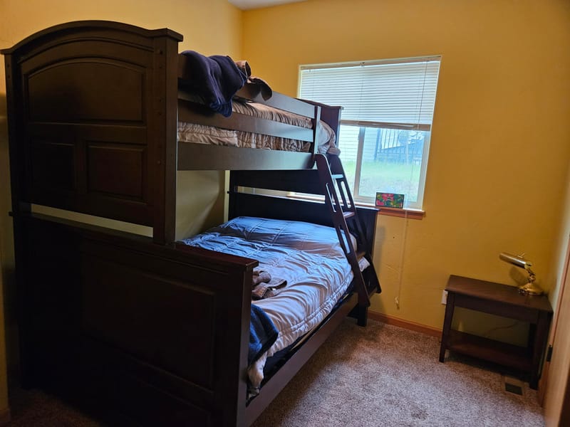 Bunk room with a twin-over-full bunk