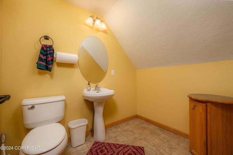 Half bath with a pedestal sink