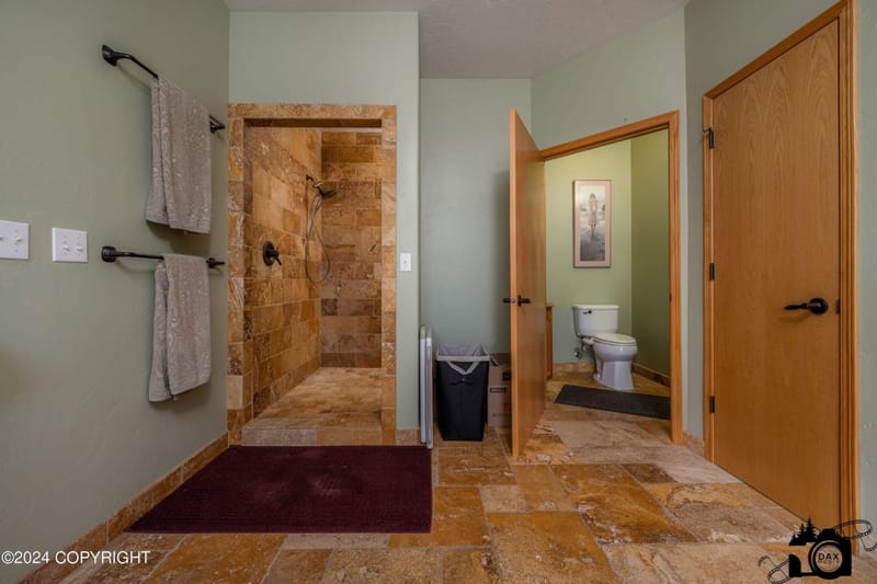 Walk-in tile shower off the primary bath